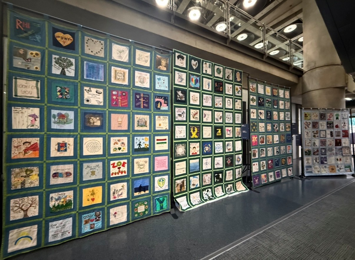 Speak Their Name suicide memorial quilts on display at Consortium for the Prevention of Suicide Conference 2026